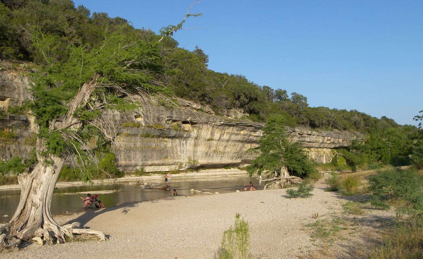 A bluff on the Guadalupe River in Guadalupe River State Park , Texas, United States.
